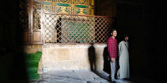 Syrian tourists enter the citadel in Aleppo, Syria