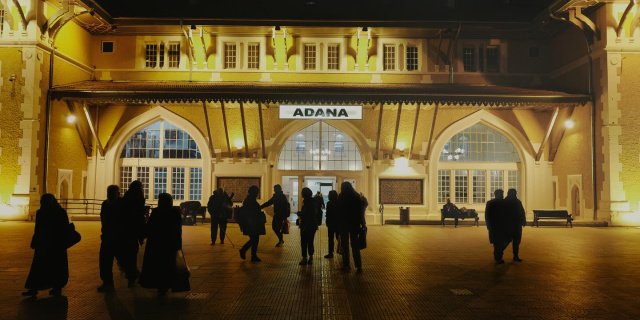 A night view of the entrance to the Adana train station in Adana, Turkey
